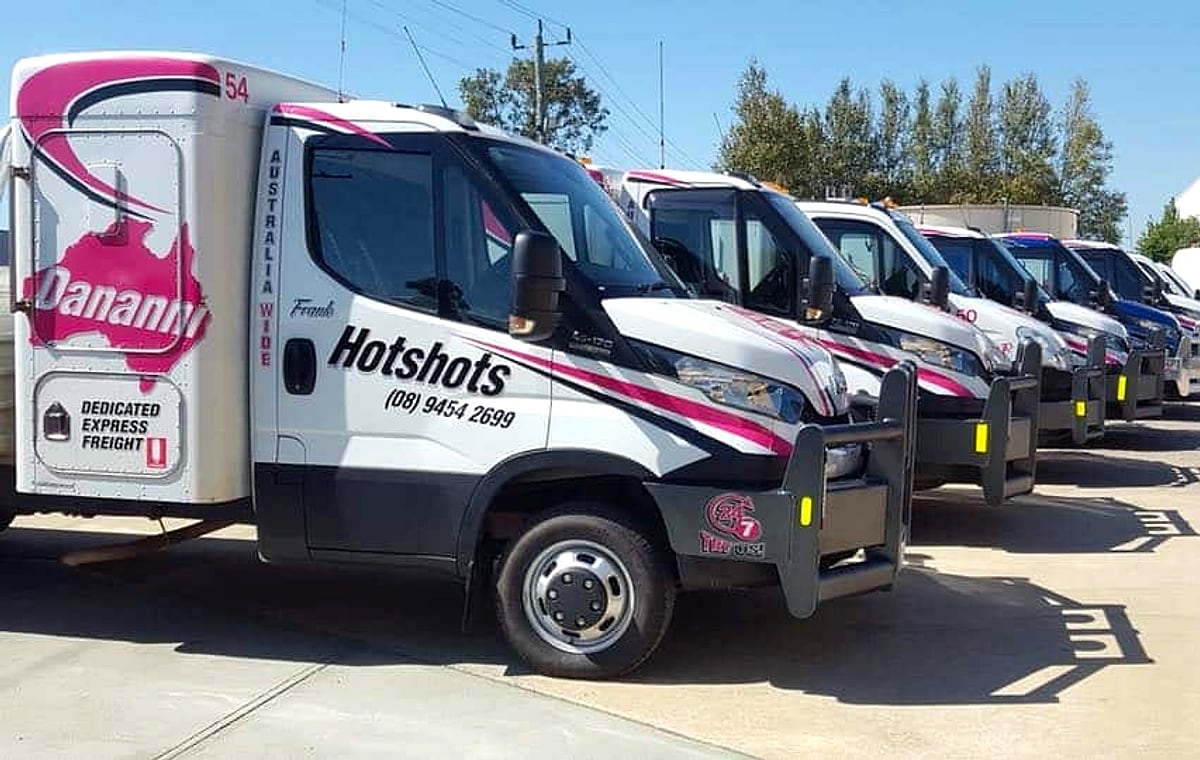 Line-up of Dananni Hotshots Iveco hotshot tray trucks